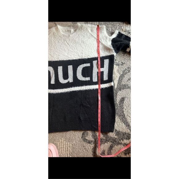 Oversized, cold shoulder, black and white fuzzy sweater. - Picture 10 of 12
